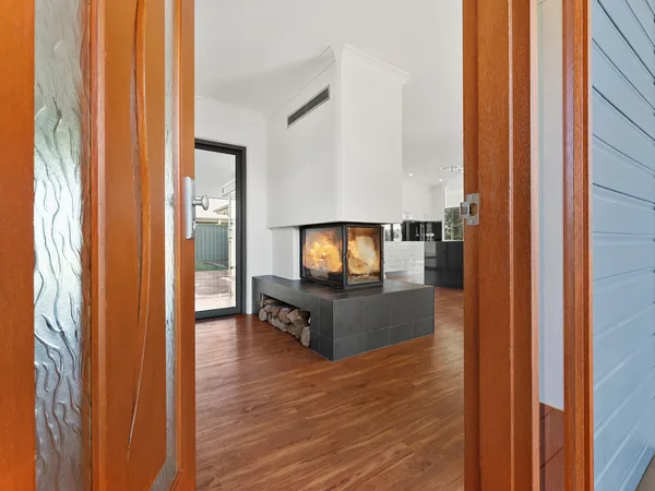 Example photo: open-plan living with a double-sided fireplace